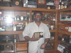 Rod Garland came by my house for a visit! Here he is checking out my antique radio collection!