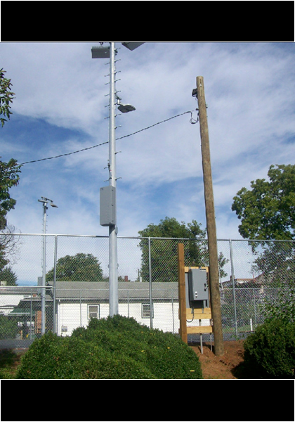 The fence is up, and the night floodlights! The fence is up, and the night floodlights!