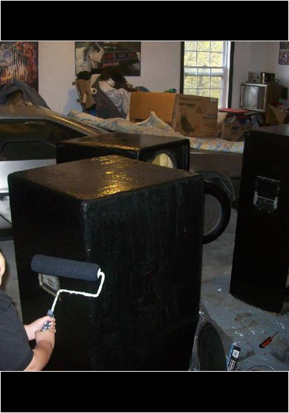 Helping Dad do some work, painting his speakers!