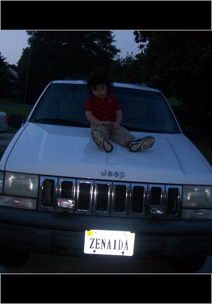 Posing on Zee's Jeep!
