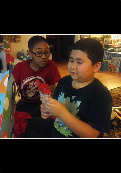 Cousin Eric and Jarred opening gifts for his 11th birthday party!
