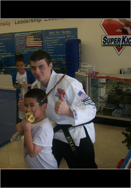 At Jarred's birthday party at Super Kicks, instructor Davis entertained the kids!