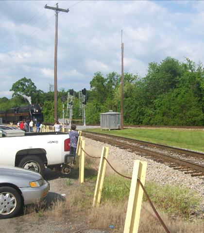 She'll be comin' round the mountain! She'll be comin' round the mountain!