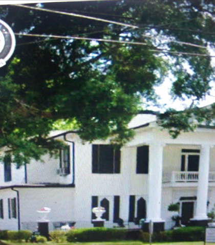 Notice the white house in the background, it is a block from the Police Station! Notice the white house in the background, it is a block from the Police Station!