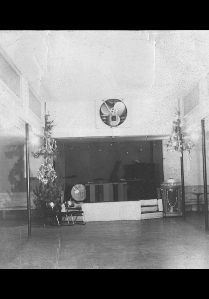 The Mecca! A classy venue back in the day! Notice the large dance floor suitable for all occasions. I spotted a Seeburg "trash can" Jukebox music system (just to the right of the stage), which probably filled the room with all of the music from the decade!