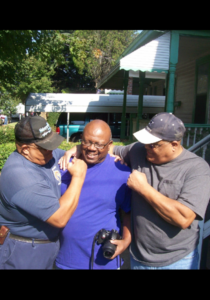 Earl & John Spinner beating up on Russell Hill!