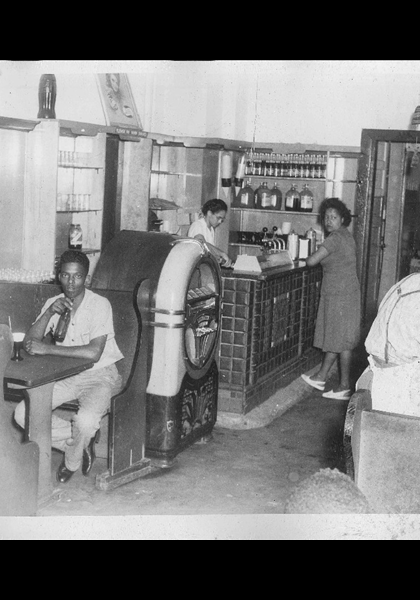 This shows the resturant/soda fountain, ice cream parlor, area of the Mecca! You know I'm a jukebox nut, and believe that this is a Wurlitzer, popular during the time!