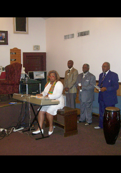 Hermina Walthall Hendricks directing the choir!