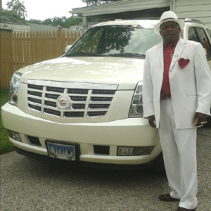 John Crews DHS-'69, and his Cadillac Escalade....Go John!
