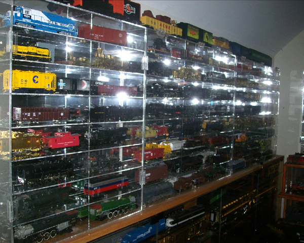 Wiley installed glass cases for his special rare and special locomotives and train cars. The cases went from one wall to the other! Wiley installed glass cases for his special rare and special locomotives and train cars. The cases went from one wall to the other!