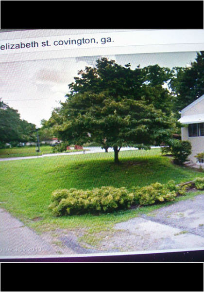 I found this one by following down Floyd street till I saw the house across the street! Notice the driveway, and the side steps!