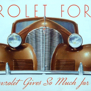 Got it! It was a '39 chevy, he got the fog light option! I'll bet I know one thing....he didn't get a radio! He liked to drive in silence?? Wait a minute. my Dad, NO RADIO? Go figure??