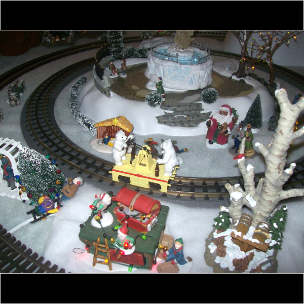 Two polar bears, on a handcar, going in circles!