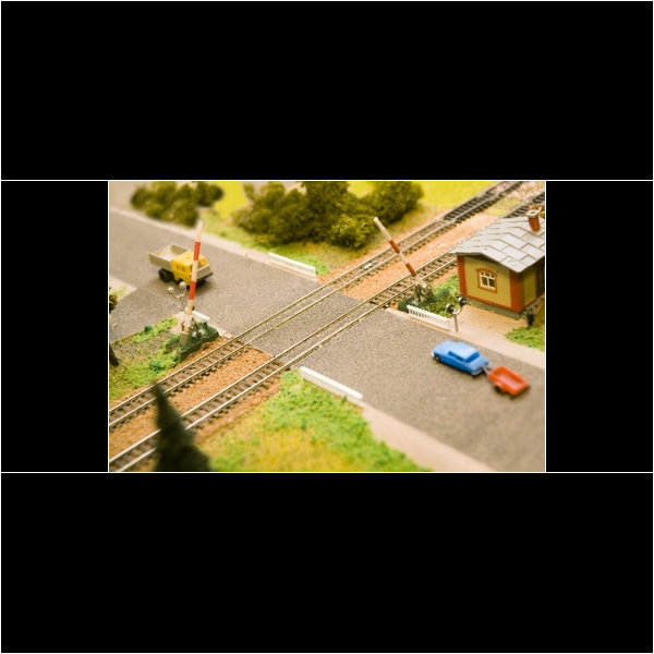 The set in this picture was larger than my figure 8 set! My train set fit on a 6' X 4' piece of plywood, and I thought mine was super bad! I was into Aurora HO race car sets!