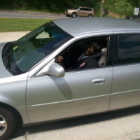 Rev. James Johnson, in the Caddy!