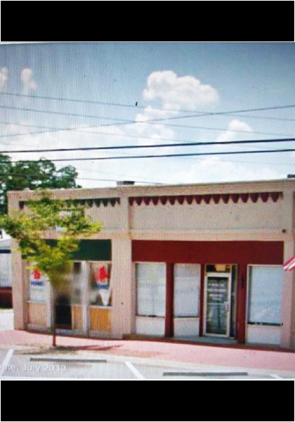 Notice the decorations along the top of the building, the doors and windows!