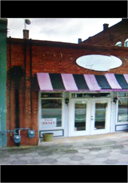 Same building, notice the gas and electric meters!