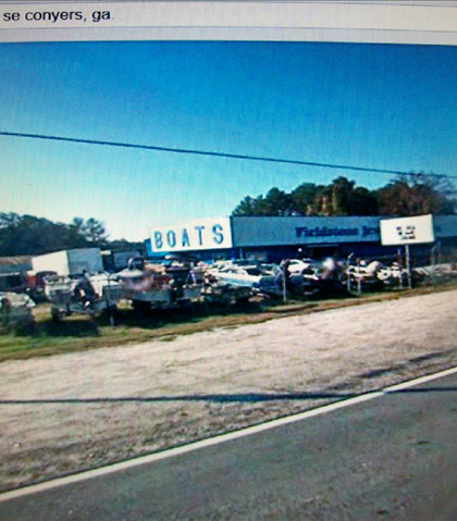 When the shooter in first girl speeds out of the boat lot, the sign says Covington 9 miles! When the shooter in first girl speeds out of the boat lot, the sign says Covington 9 miles!